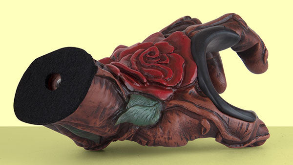 Bella Rose hand guitar hanger with yellow background.