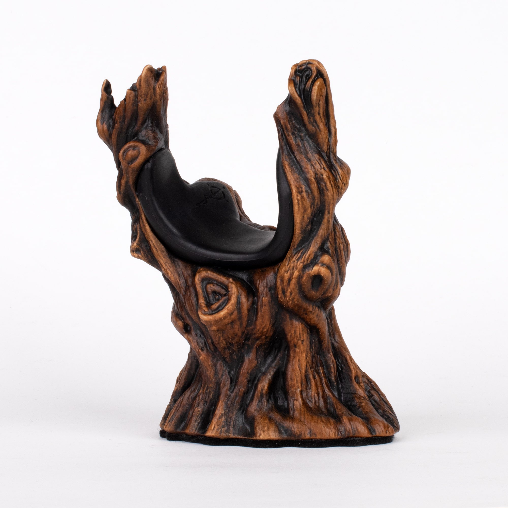 Tree shaped guitar hanger wall display with bark finish for electric and other acoustic instruments.
