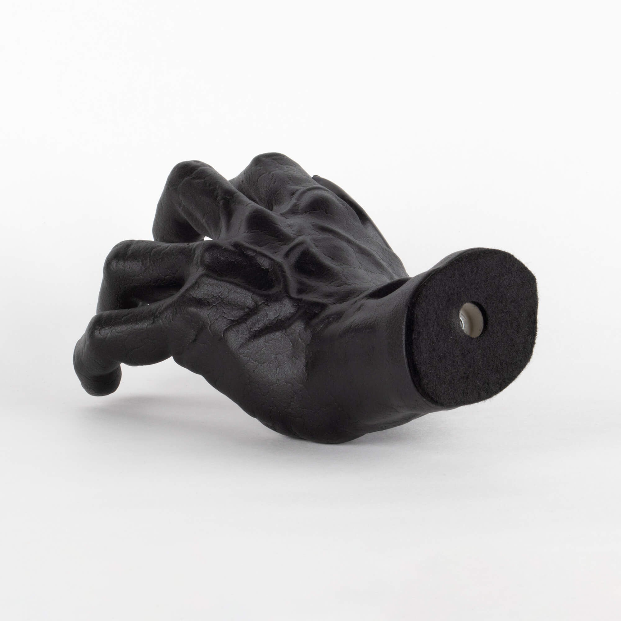 Back view of black GuitarGrip guitar holder for wall display.