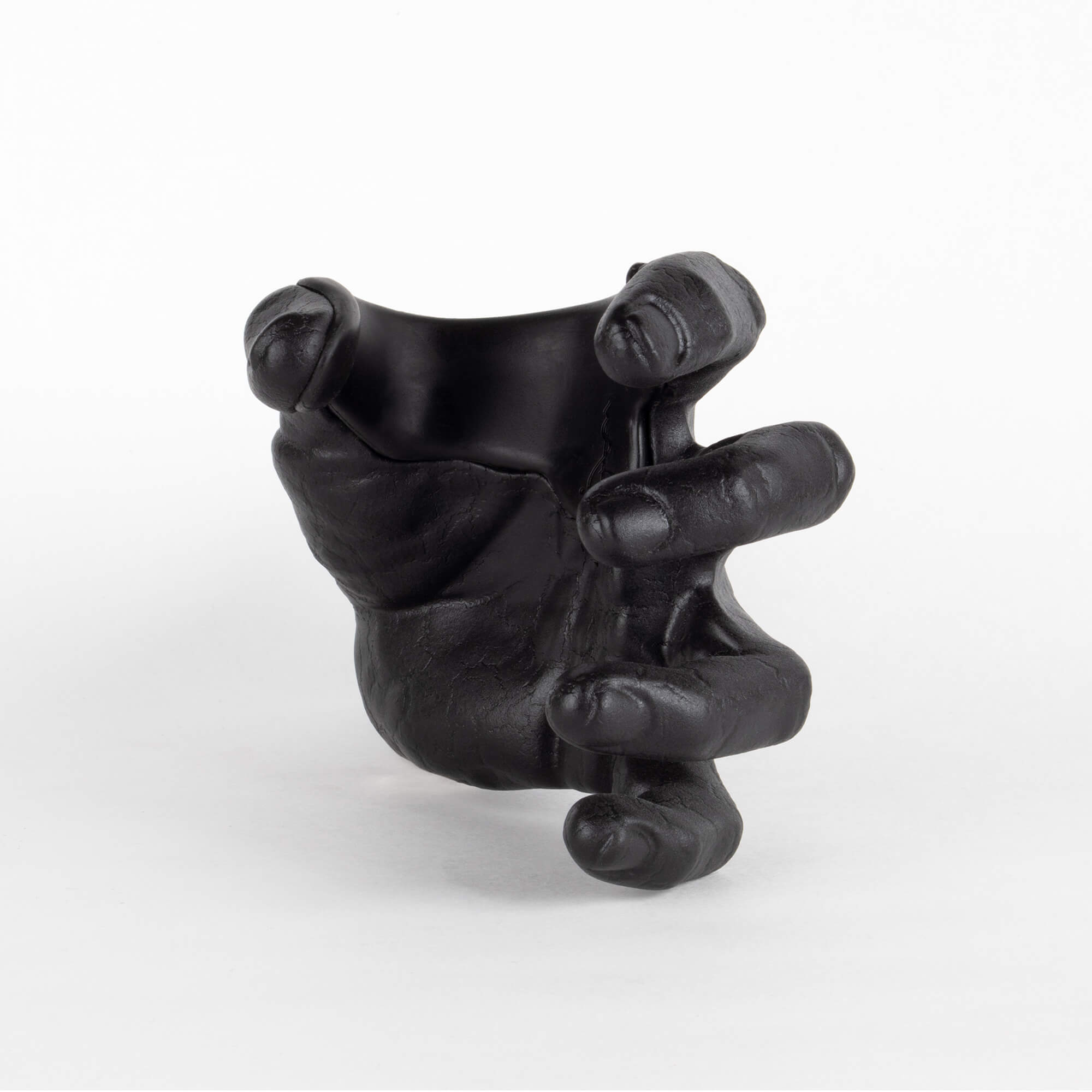 Front view of guitar wall hanger in black cracked finish.