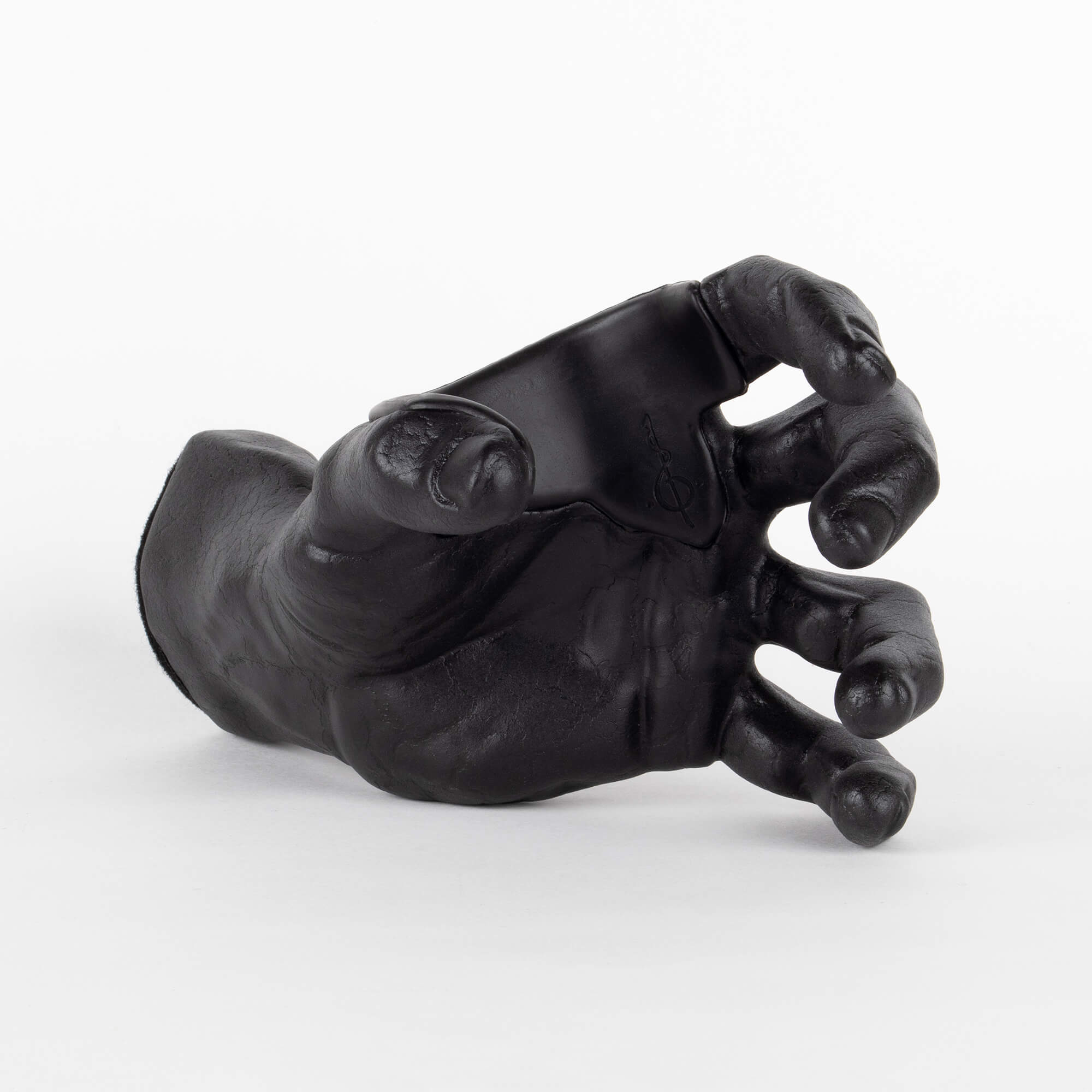 Guitar Hanger front view with black finish and shaped like a hand.