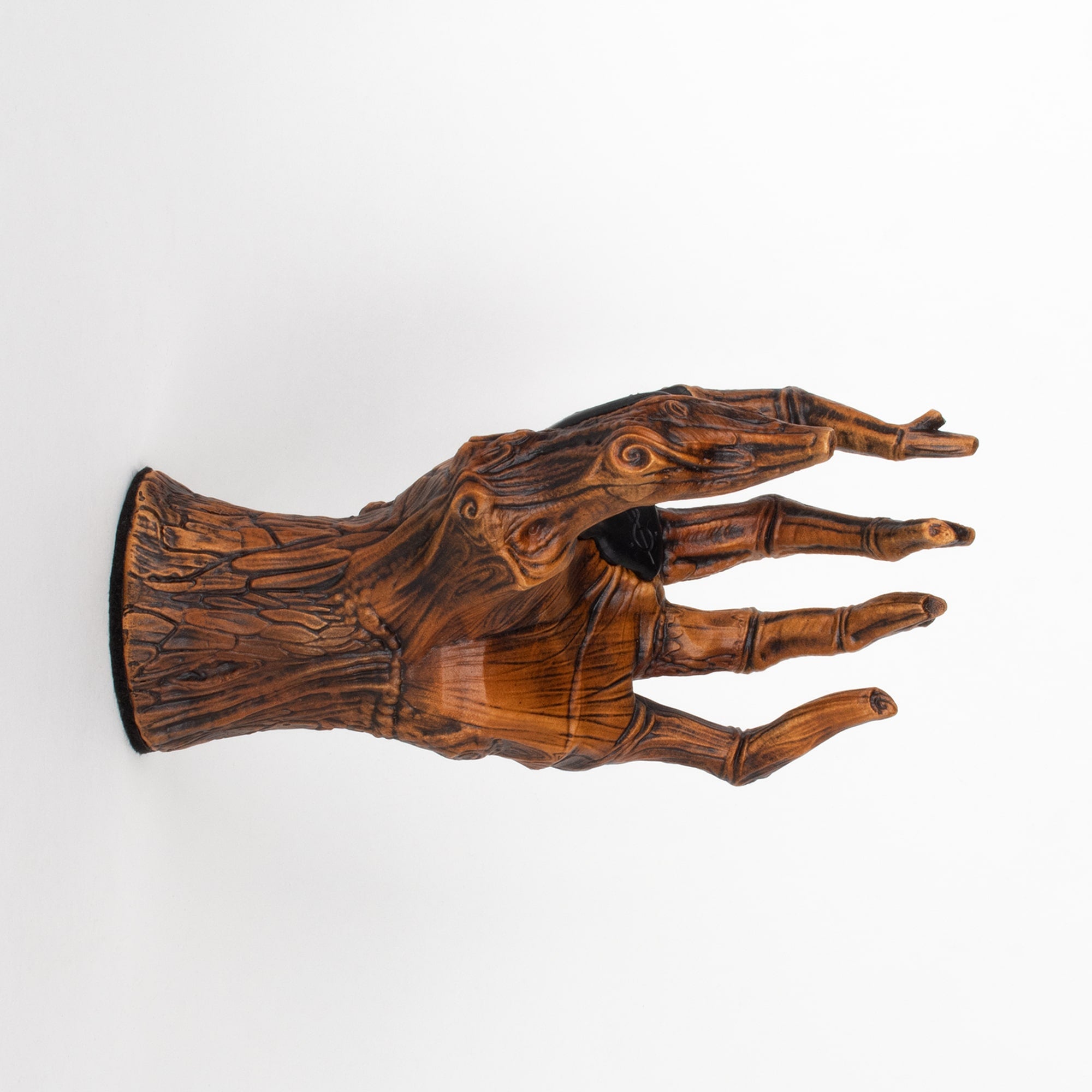 Guitar wall mount in the shape of a tree hand inside view.