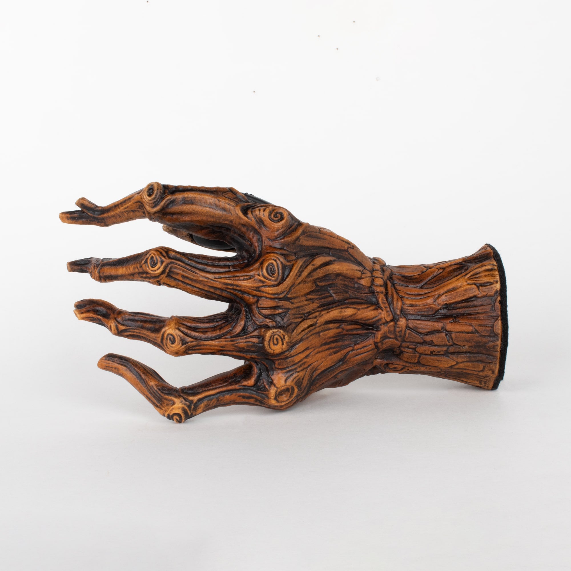 Guitar hanger wall mount in the shape of a tree hand outside view.