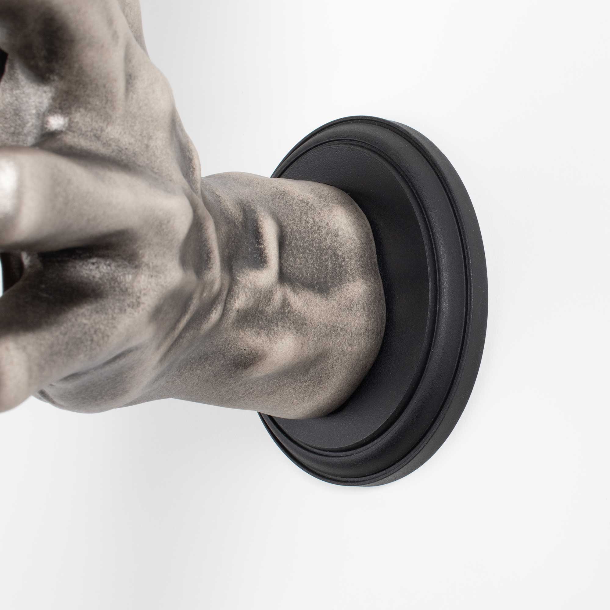 Hand wall mount guitar hanger with oval disc for easy install.