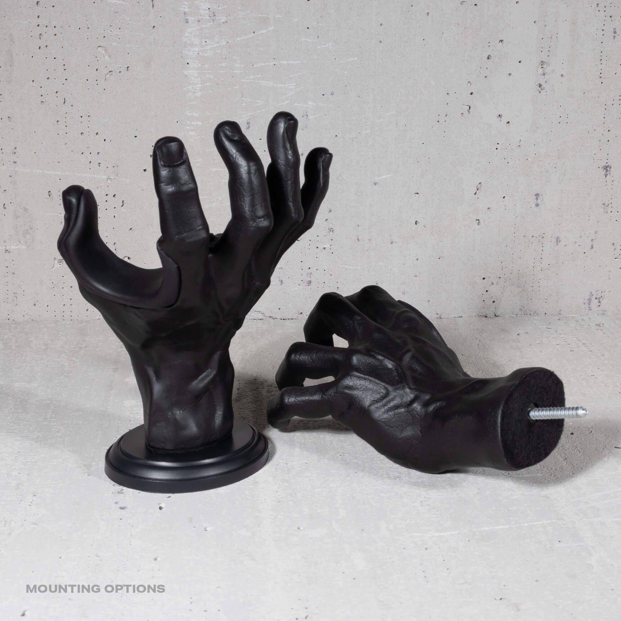 Black decorative wall mount for hanging guitars on the wall.