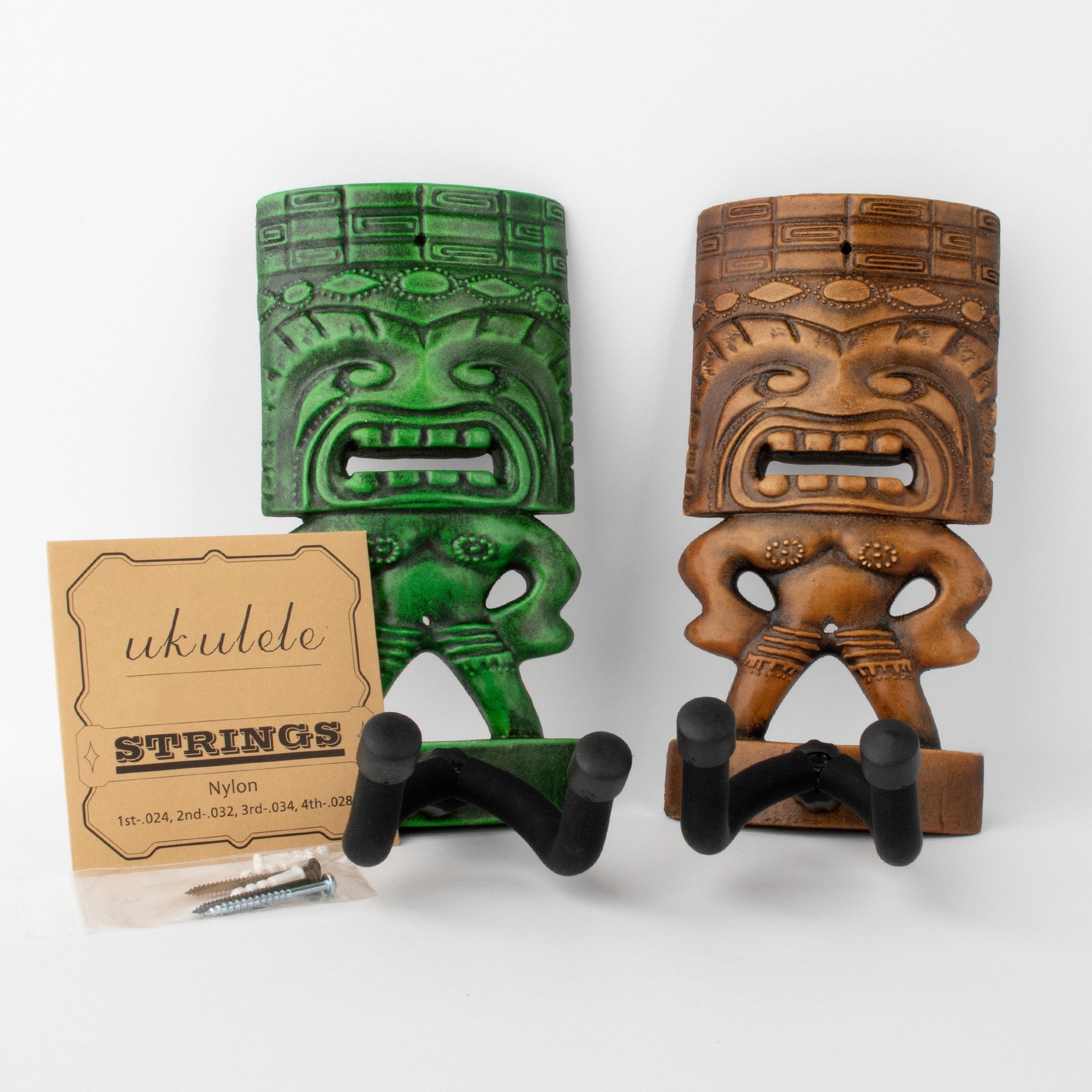 all-groups Green and brown tiki ukulele hangers.