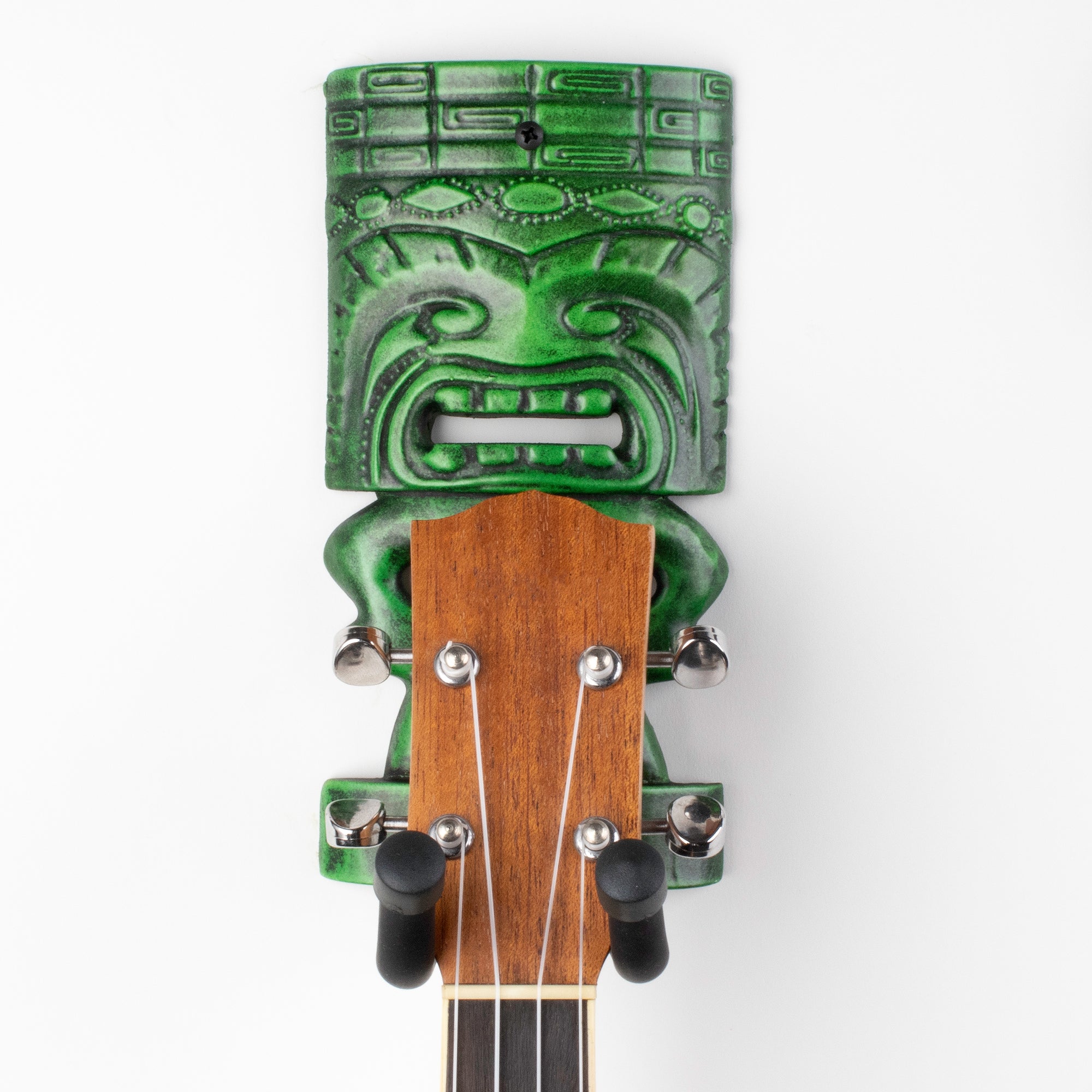 Green tiki ukulele hanger wall mount.