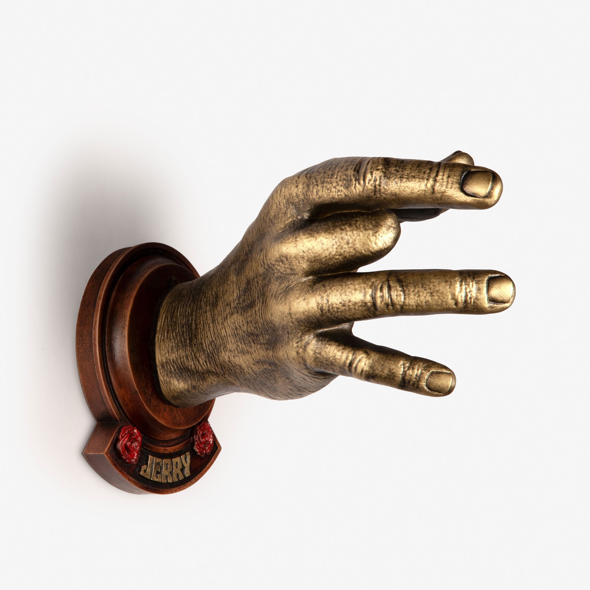 Jerry Garcia guitar hanger in gold finish with wood stained backplate.