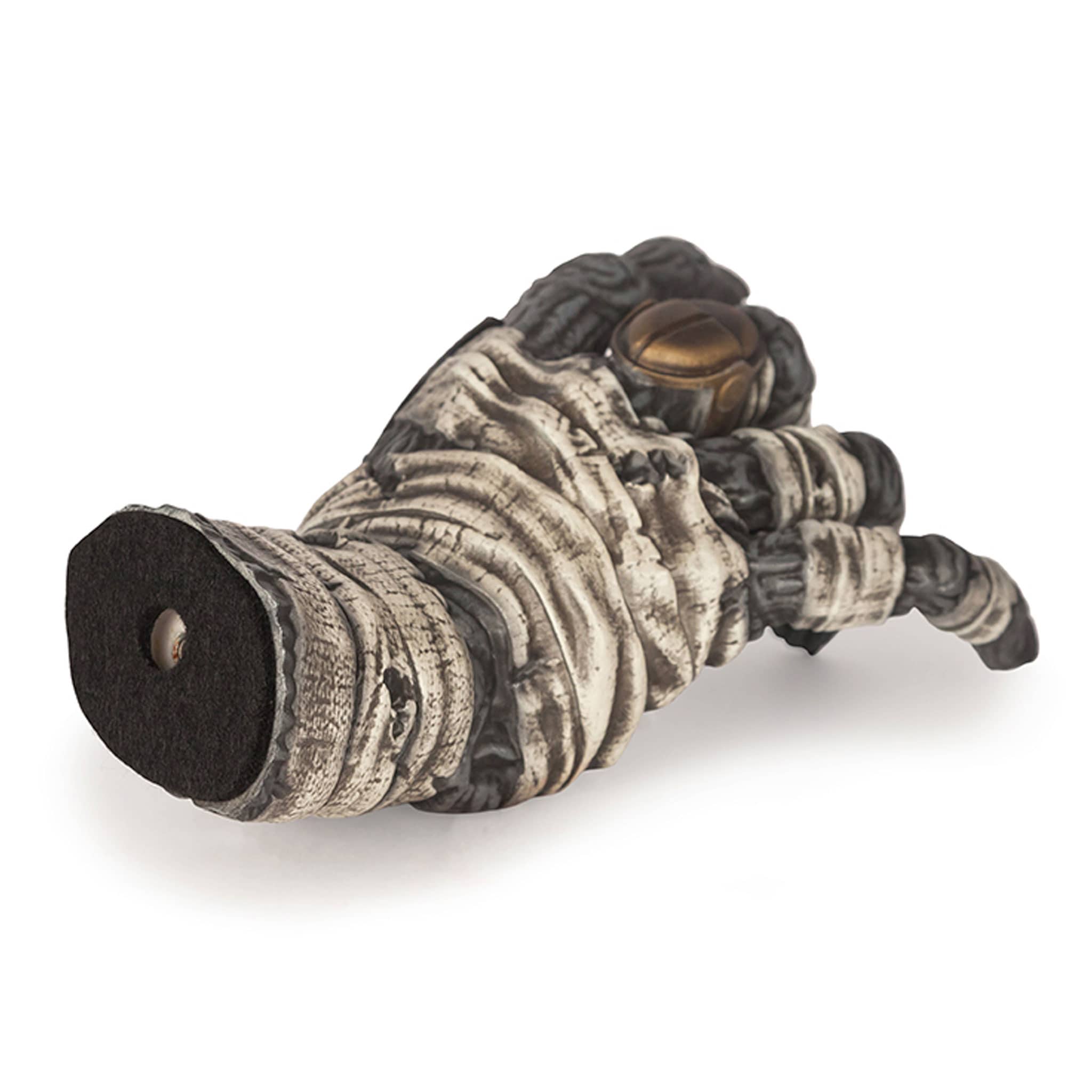 Mummy hand with gold ring and white wrapping used for hanging guitars. Back view.