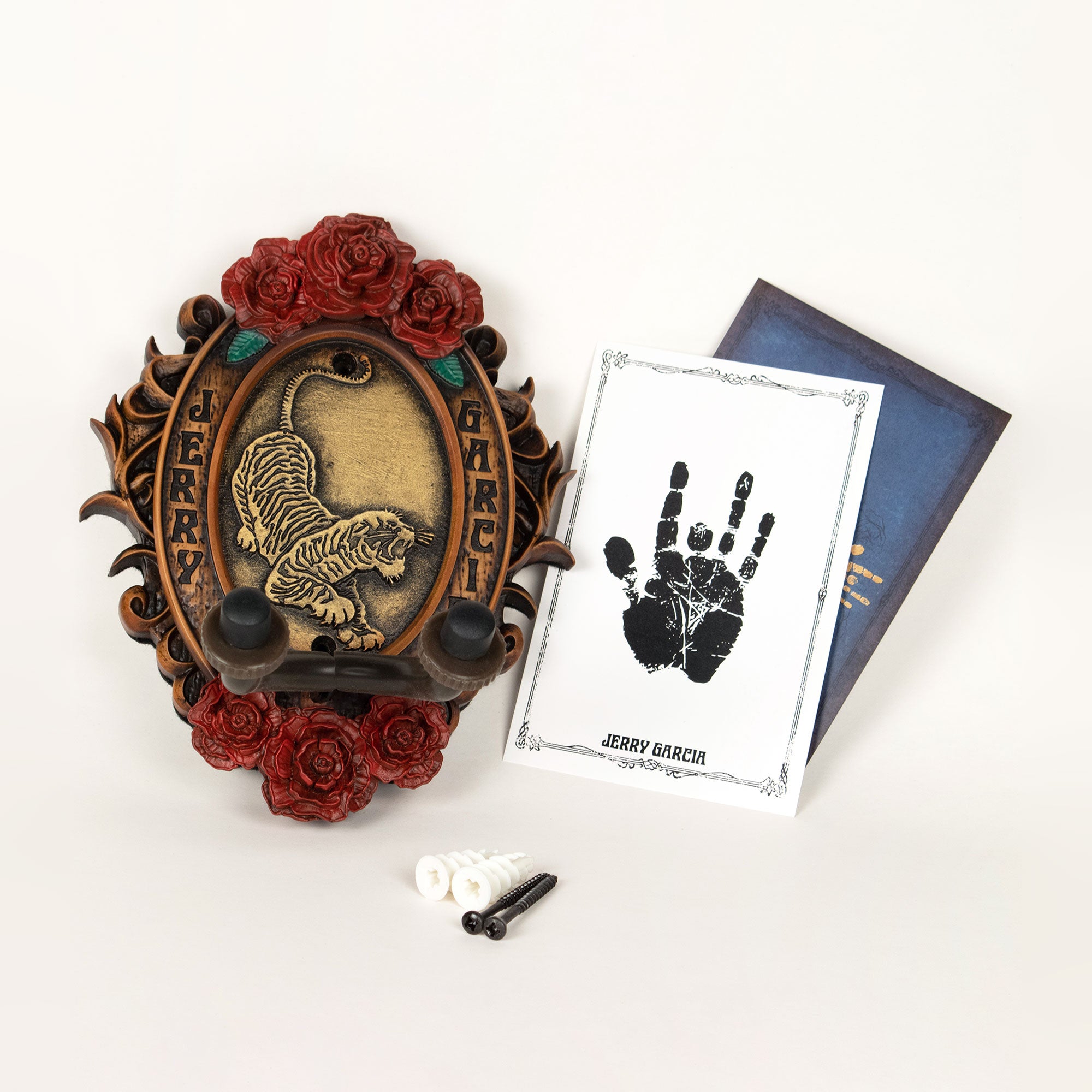 Showing whats included with Tiger Logo guitar hanger. Instructions and mounting screws included.