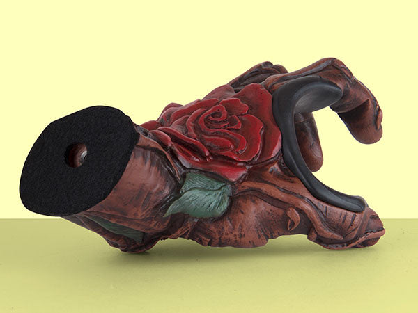 Bella Rose hand guitar hanger with yellow background.