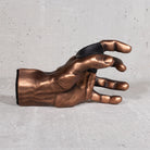 Copper GuitarGrip left-hand guitar wall hanger displayed in a horizontal side view.