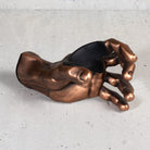 Copper GuitarGrip left-hand guitar holder shown from a top view highlighting the inner cradle.