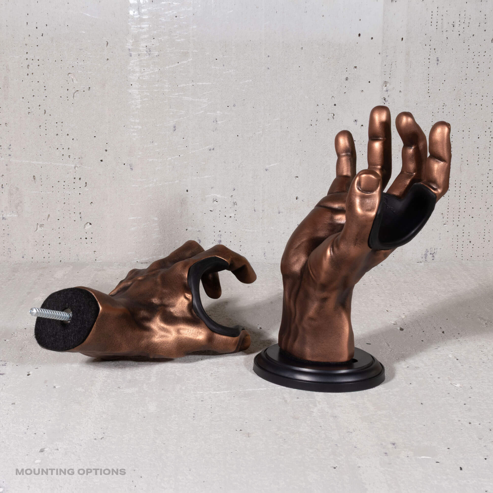 Copper GuitarGrip left and right guitar wall hangers shown with both mounting bases.